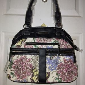 Brand new Stone Mountain purse with multiple colors.